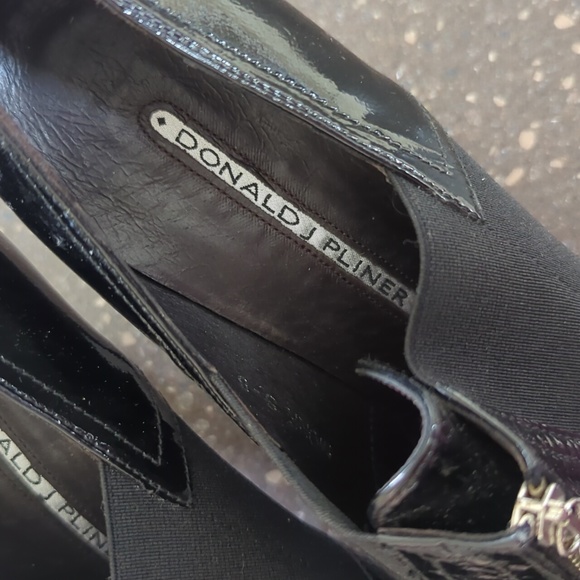 Black patent leather zip up Donald J Pliner heels, silver peace sign hardware - Picture 2 of 6